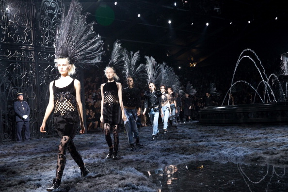 A model walks the runway at the Louis Vuitton Spring Summer 2014