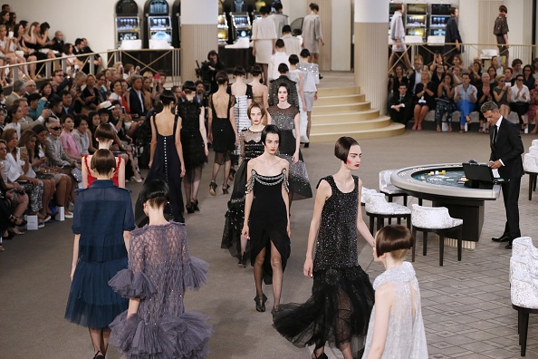 Models present creations for Chanel during the 2015-2016 fall/winter Haute Couture collection fashion show on July 7, 2015 at the Grand Palais in Paris.            AFP PHOTO / PATRICK KOVARIK        (Photo credit should read PATRICK KOVARIK/AFP/Getty Images)