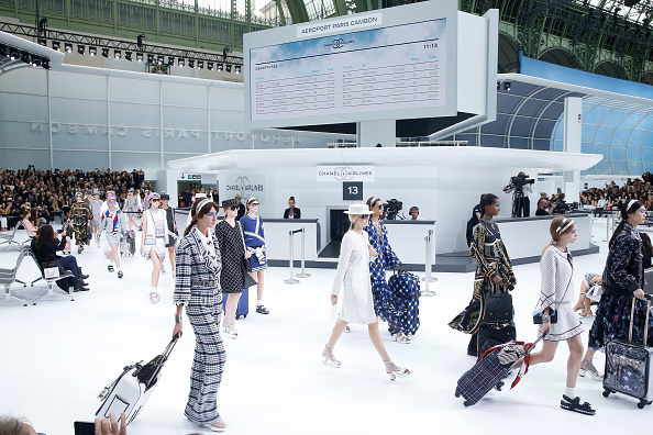 PARIS, FRANCE - OCTOBER 06:  Illustration view of Models in the "Chanel Airport" during the Chanel show as part of the Paris Fashion Week Womenswear Spring/Summer 2016 on October 6, 2015 in Paris, France.  (Photo by Rindoff/Le Segretain/Getty Images)